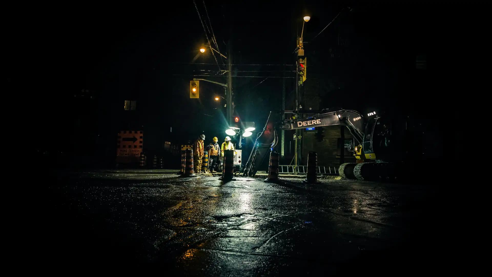 Night road works at an intersection
