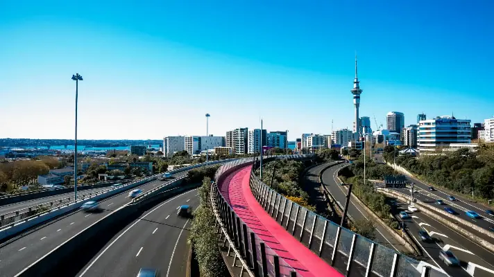 Auckland traffic report - vibrant view of Auckland's skyline featuring the pink cycleway